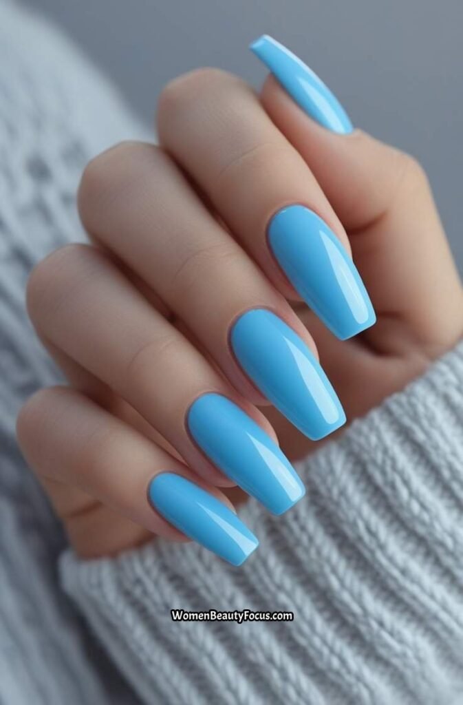 6. Sky Blue Glossy Coffin Nails