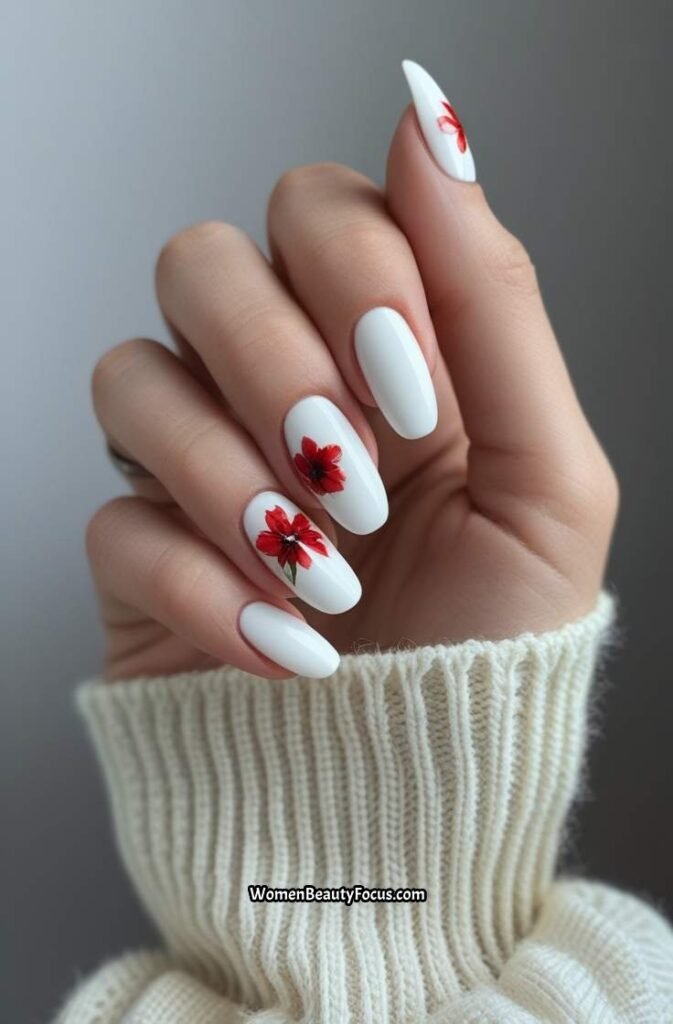 6. White Nails with Red Floral Accents