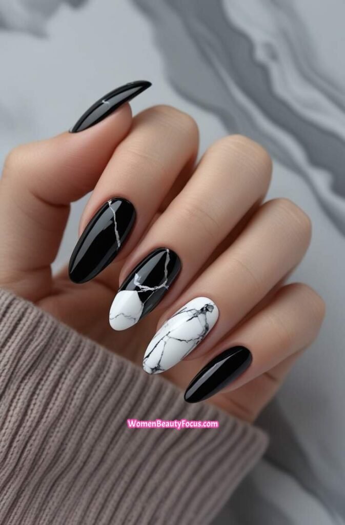 7. Black Marble Nails with White Veining