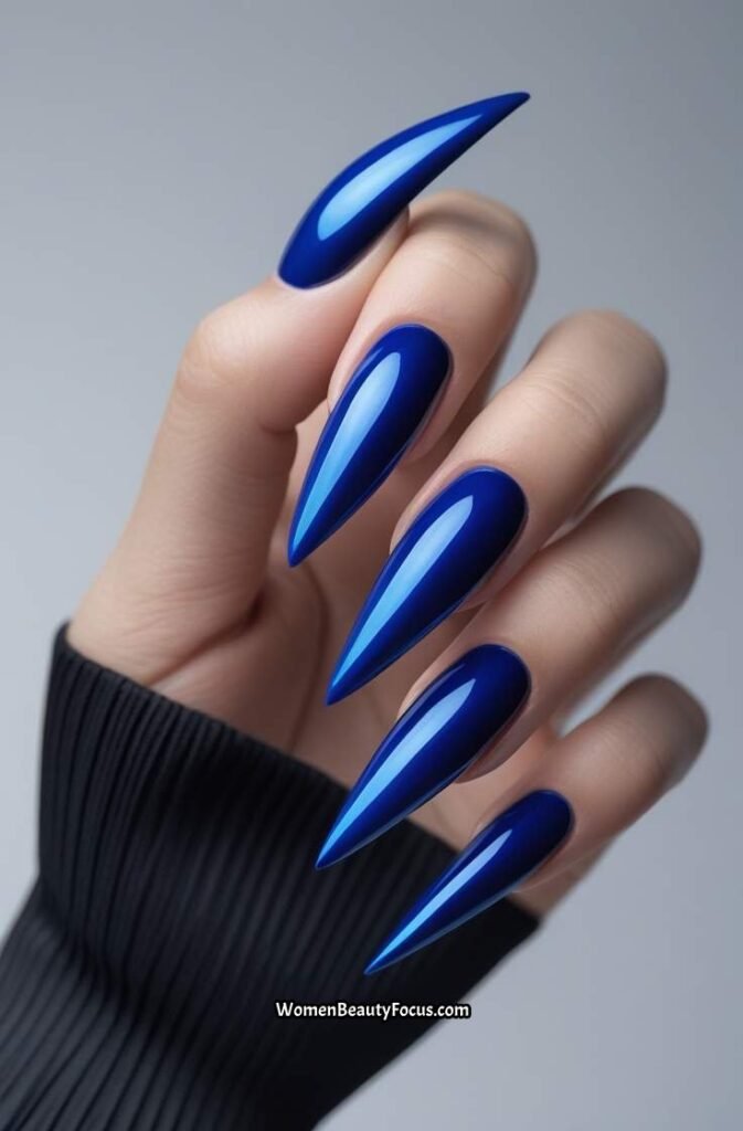7. Cobalt Blue Long Stiletto Nails