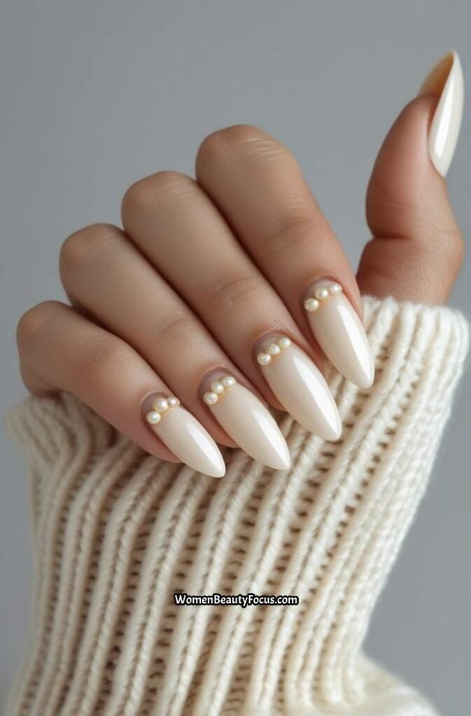 7. Elegant Almond Nails with Pearl Accents
