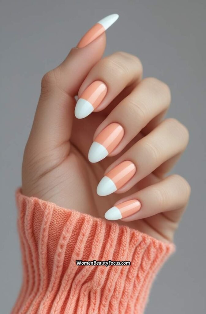 7. French Tips with Soft Peach Accents