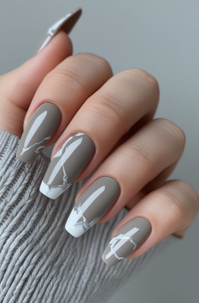 7. Greige Marble Nails with Subtle Veining