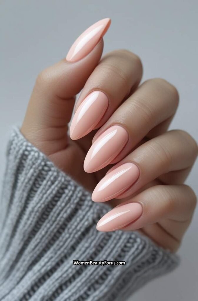 7. Peachy Pink Almond Nails