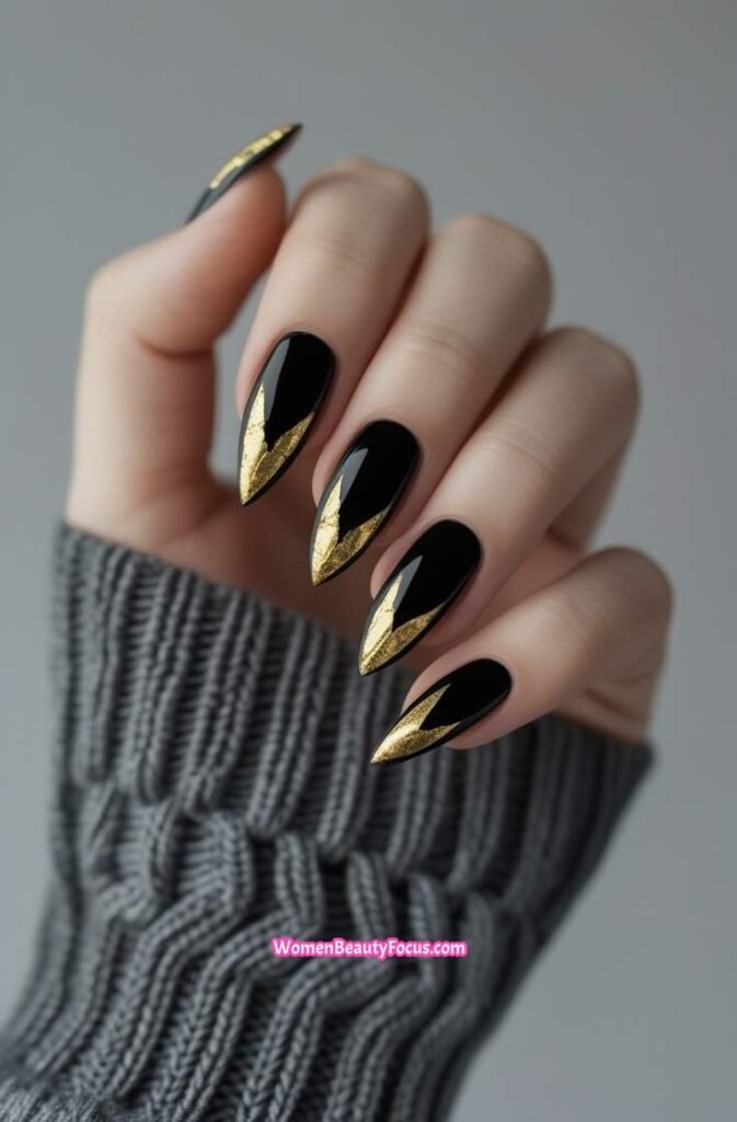 8. Black and Gold Cat Eye Nails