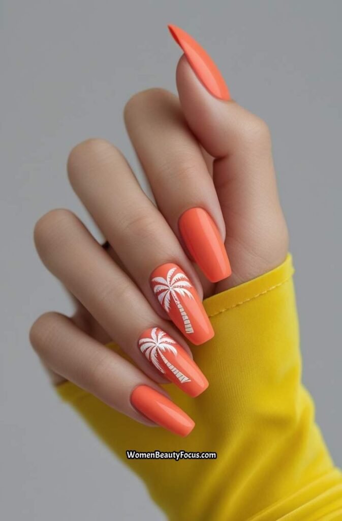 8. Coral Nails with White Palm Tree Details