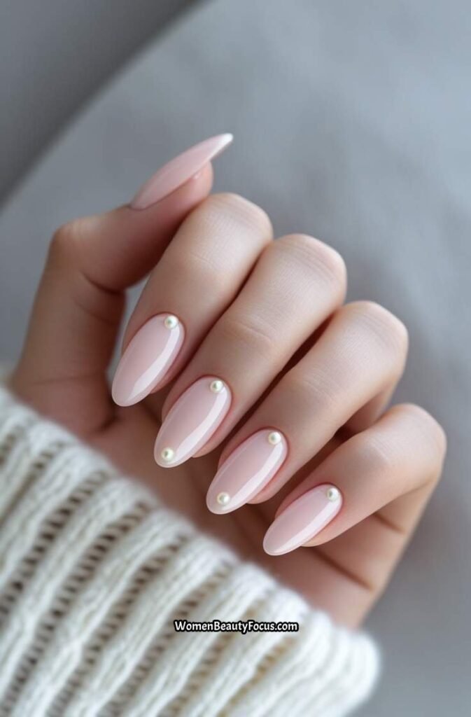 8. Light Pink Nails with Pearl Accents
