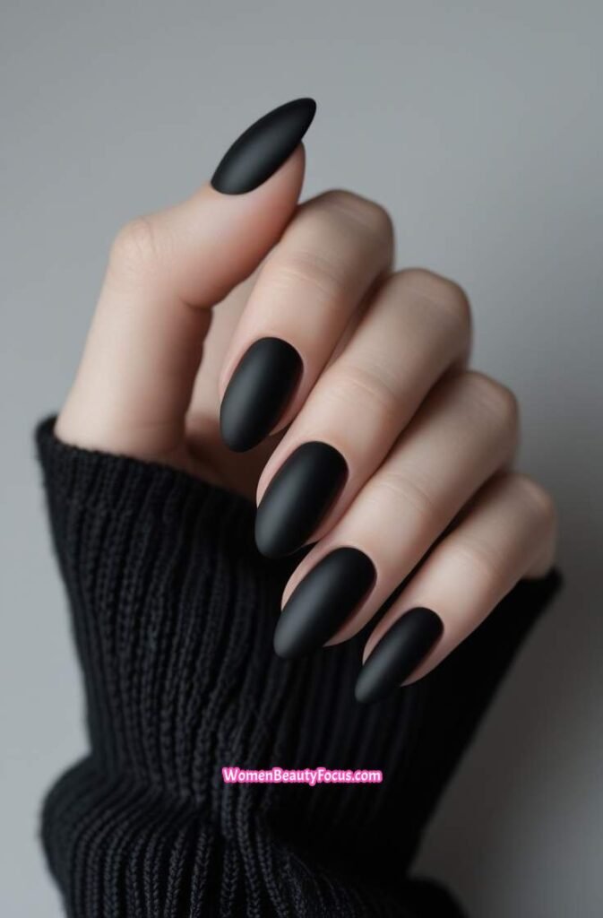8. Sleek Black Matte Nails