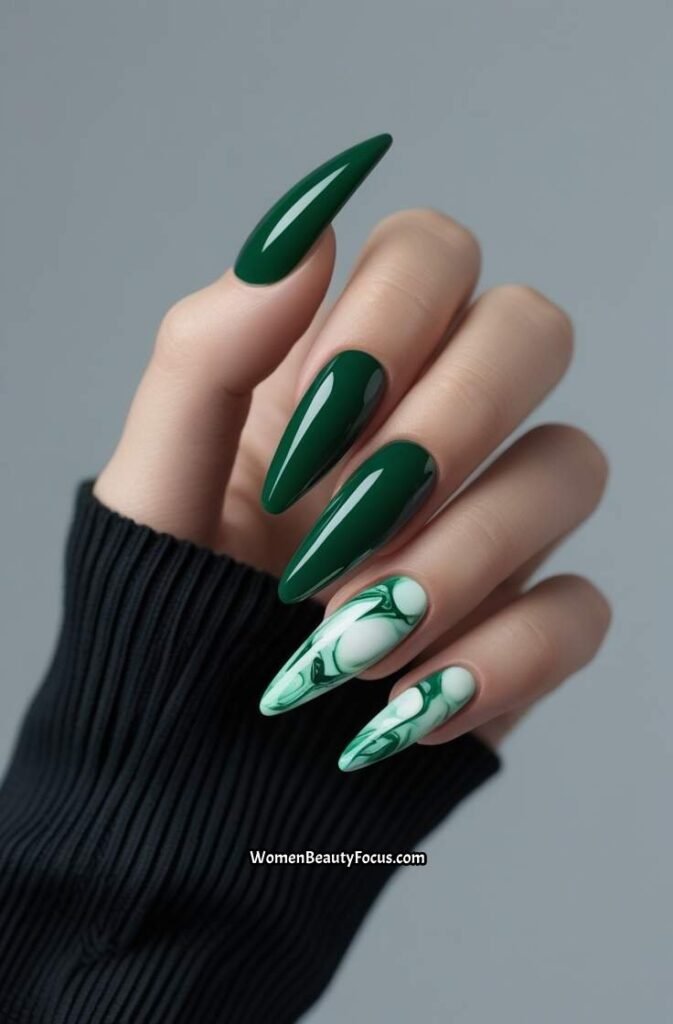 9. Deep Green Nails with Marble Accent