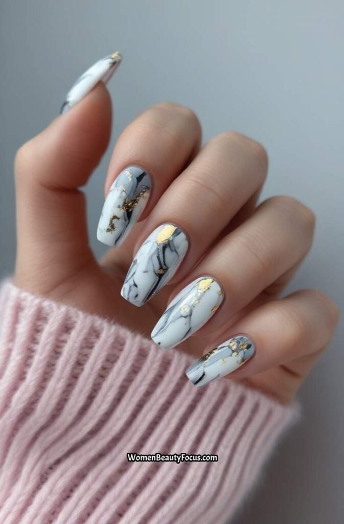 9. Marble Nail Art with Gold Flecks