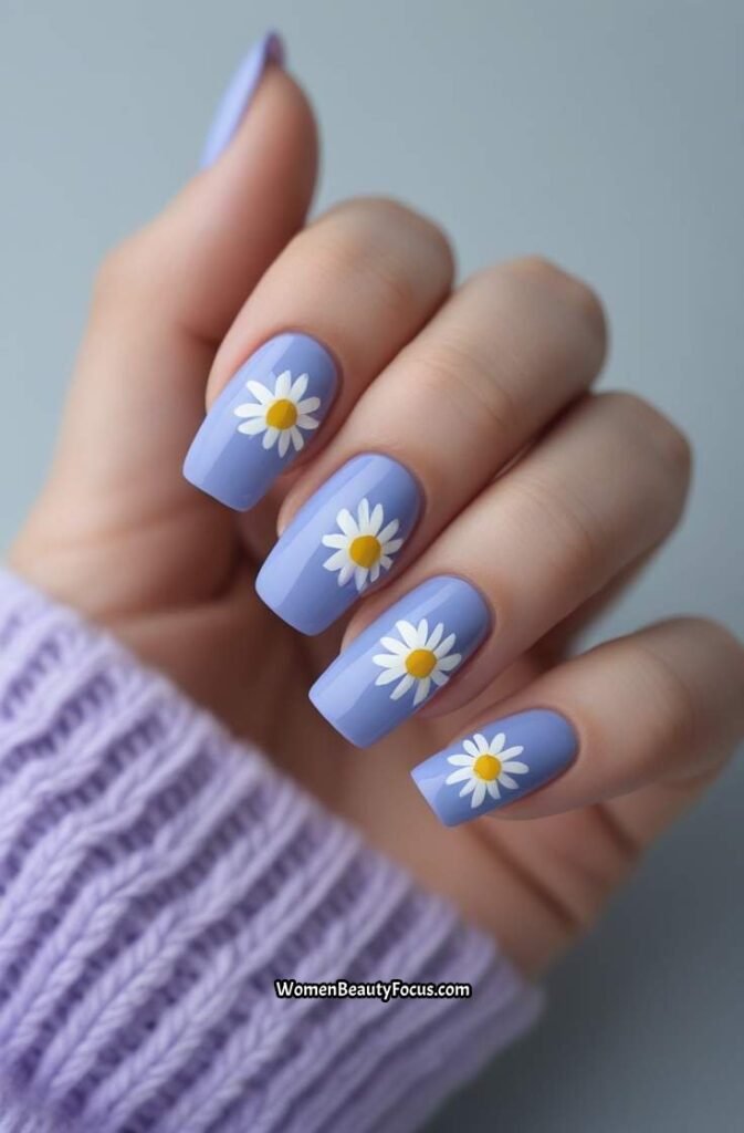 9. Periwinkle Blue Short Nails with Daisies