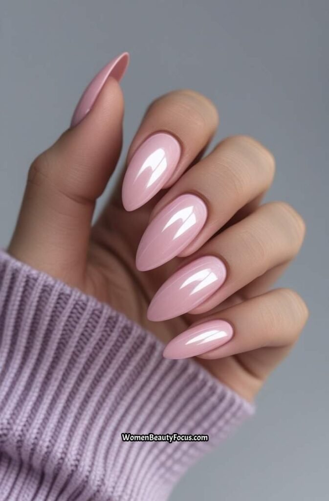 9. Soft Rose Almond Nails with Glossy Topcoat