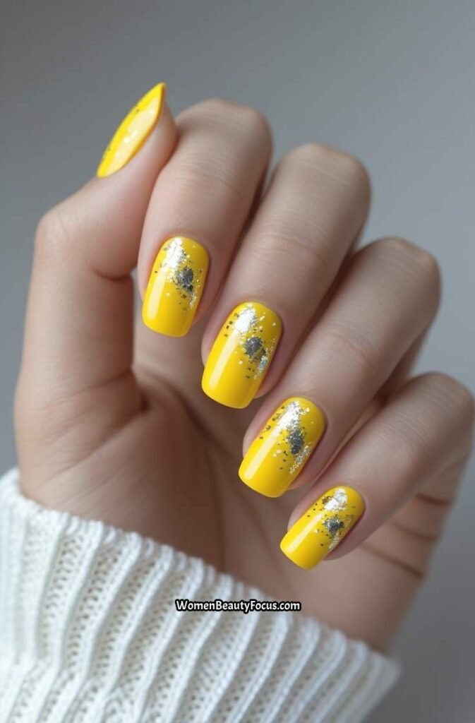 Leonardo Phoenix 10 A womans hand with yellow nails each nail 1