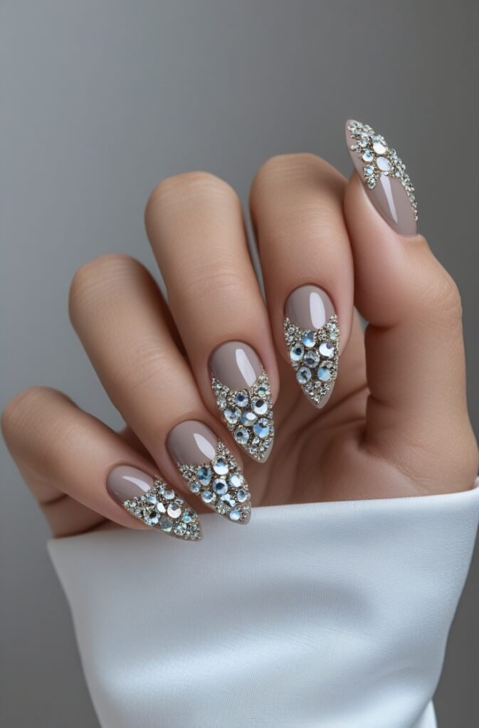 Leonardo Phoenix 10 Almond nails with crystal accents bring a 2